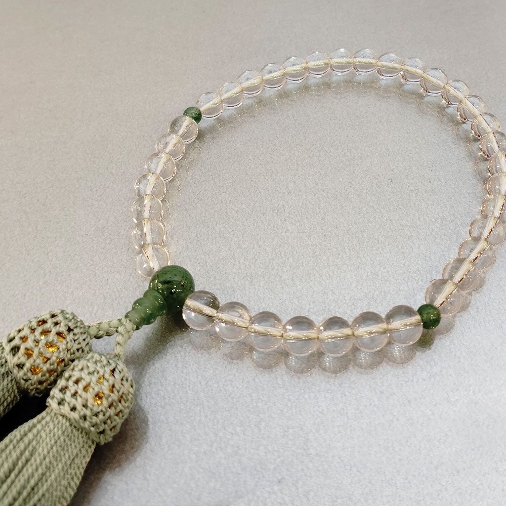 数珠 女性用「玻璃丸水晶 翡翠入」